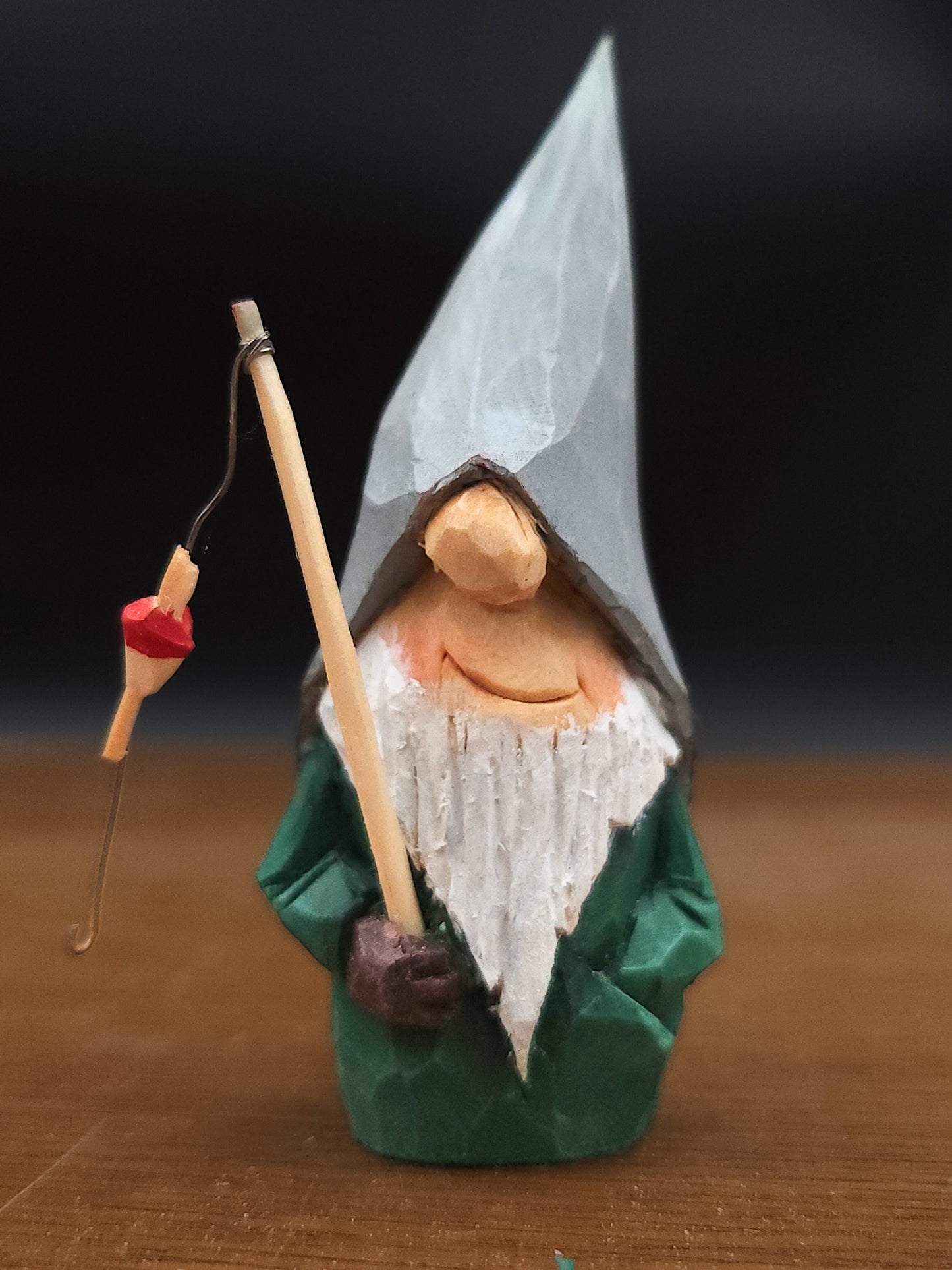 Gift idea â Nisse (Gnome, Wichtel) with grey hat and fishing rod, hand-carved Scandinavian wooden folk art, handgjord svensk trĂ€figur, einzigartiges SammlerstĂŒck för Wichtelwelt, Elfenszene och nordisk miniatyrvĂ€rld.