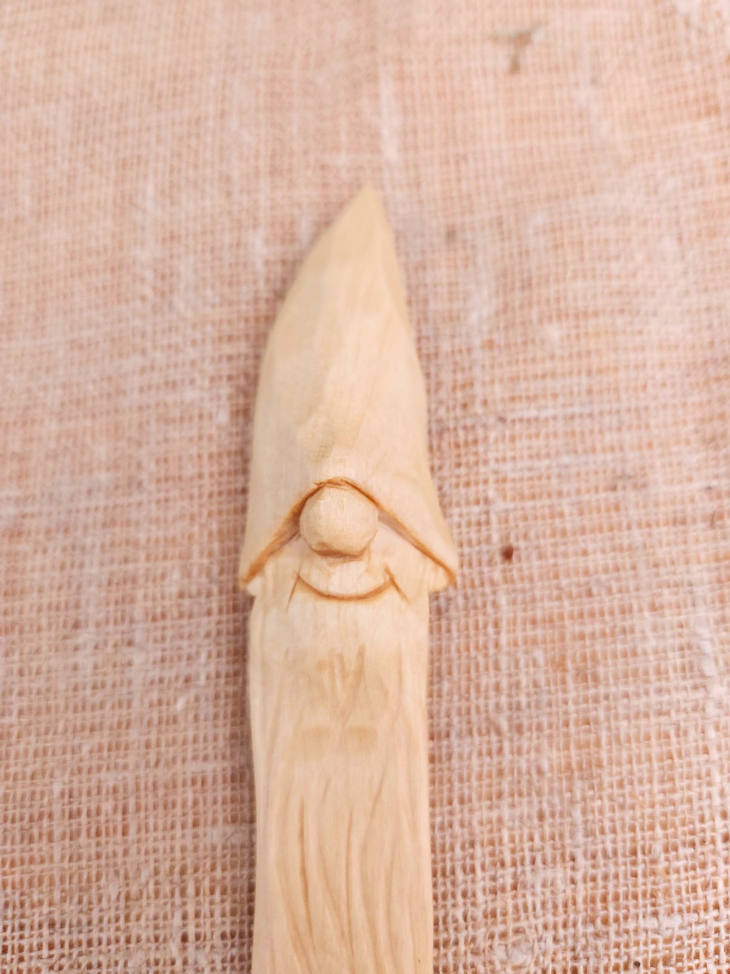 Wooden Nisse (Gnome, Wichtel) reading bookmark – hand-carved Scandinavian folk art, unique artisan gift and collectible accessory for readers.